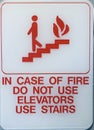 Sign showing in case of fire donÃ¢â¬â¢t use elevators but use stairs